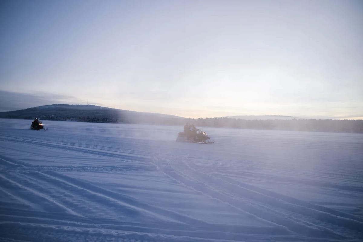 Snowmobile in winter landscape
